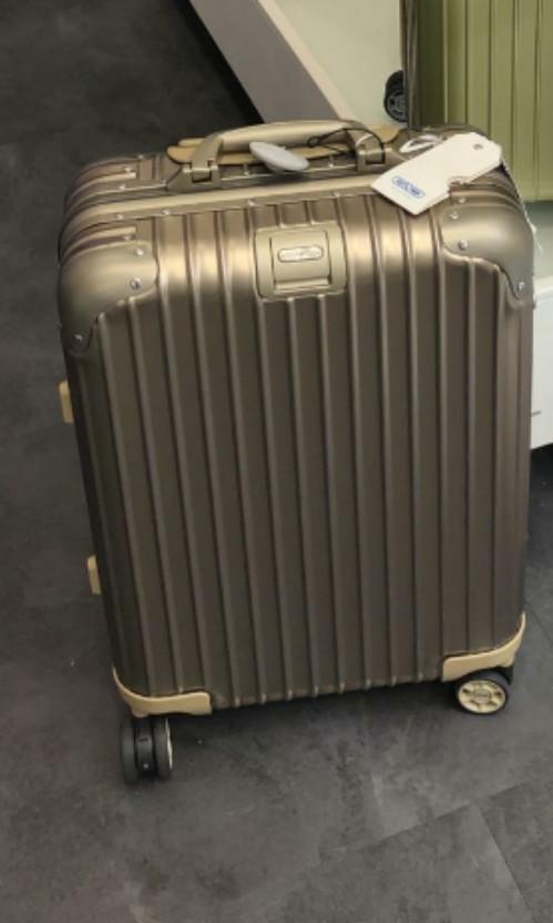 Rimowa topas cabin 32L Titanium ( Discontinued), Hobbies & Toys, Travel,  Luggage on Carousell