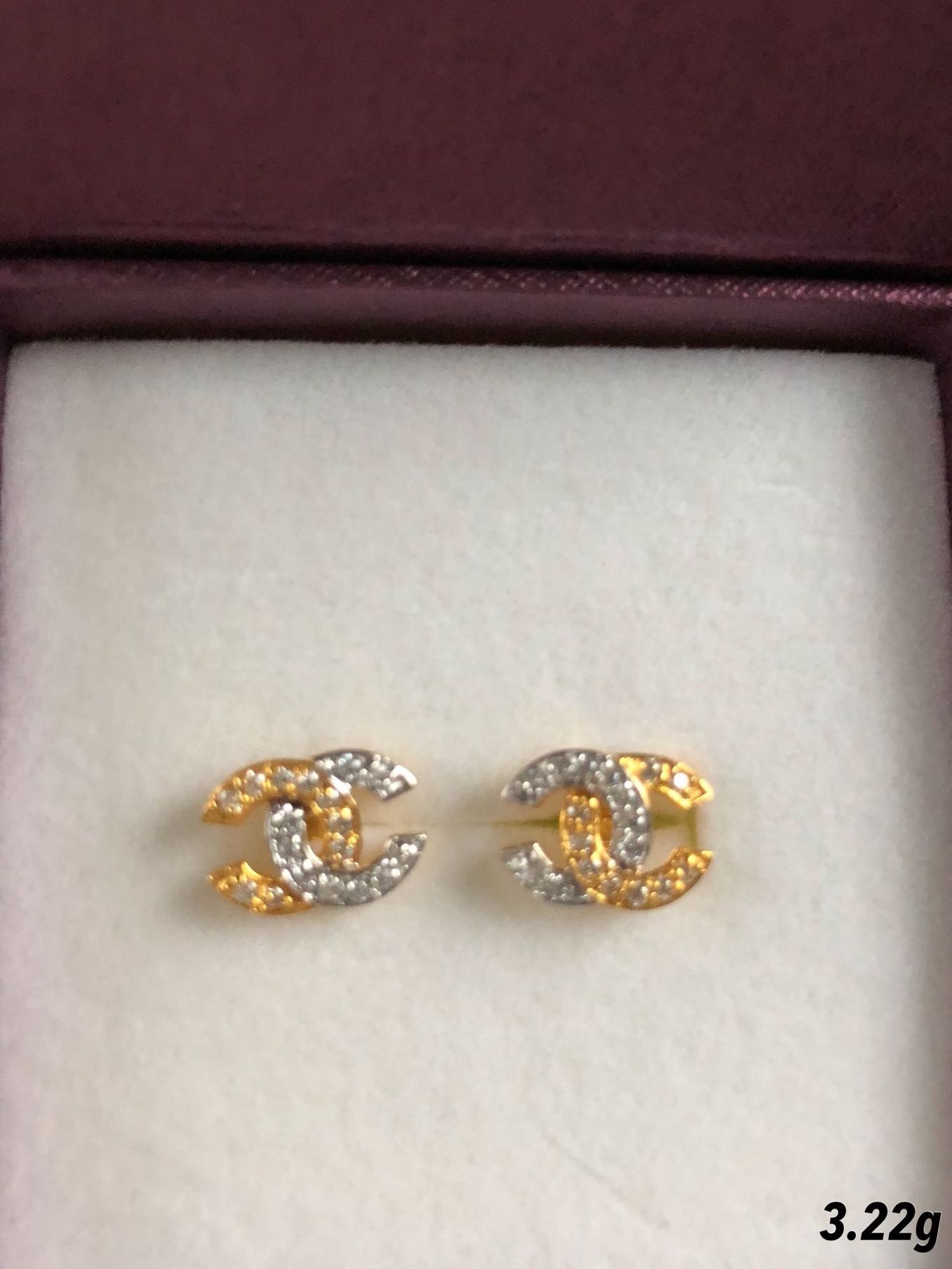 Gold top earrings chanel