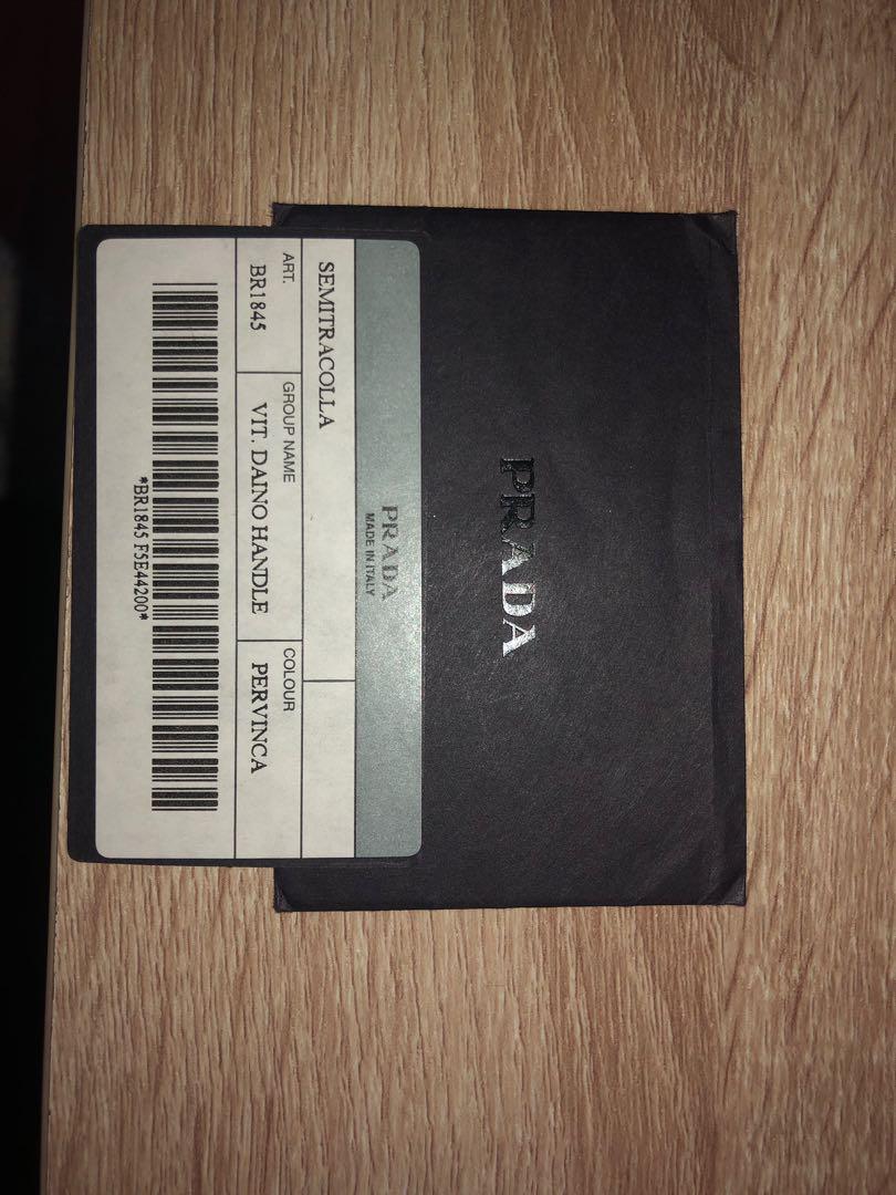 VINTAGE PRADA BAG - WITH AUTHENTICITY CARD (Category: Luxury) located in Toronto. Submitted by 416thrift (Listing ID 207553839, Image 3). Description: See pictures for details - like new condition - never used.