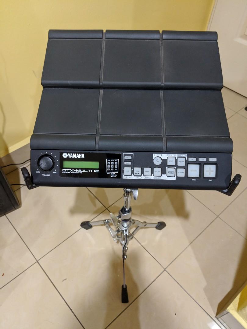 Yamaha DTX Multi 12 with Yamaha Snare Stand also comes with kick pad kp65 upon request to make it a full set