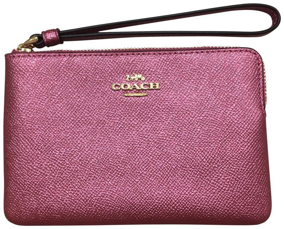 metallic pink coach purse