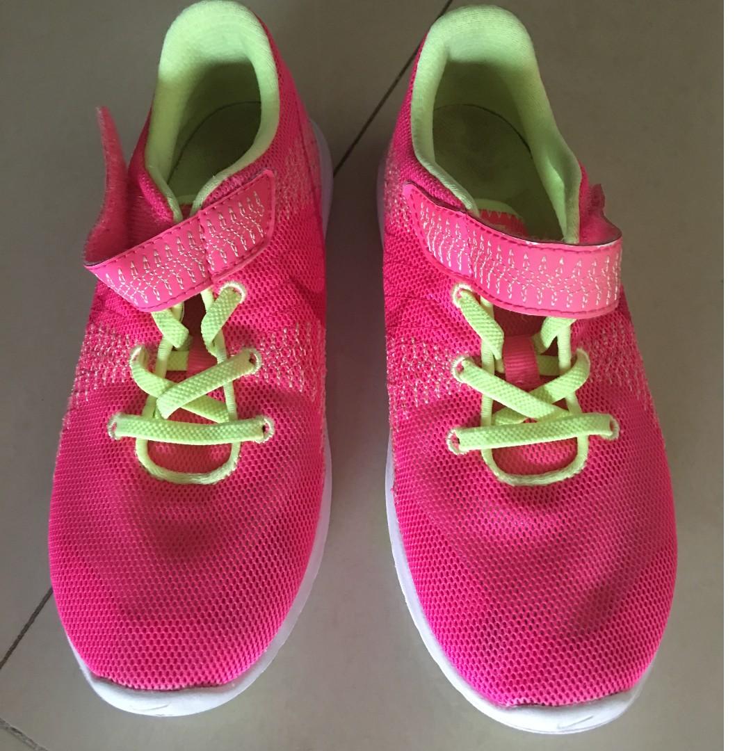 pink color nike shoes
