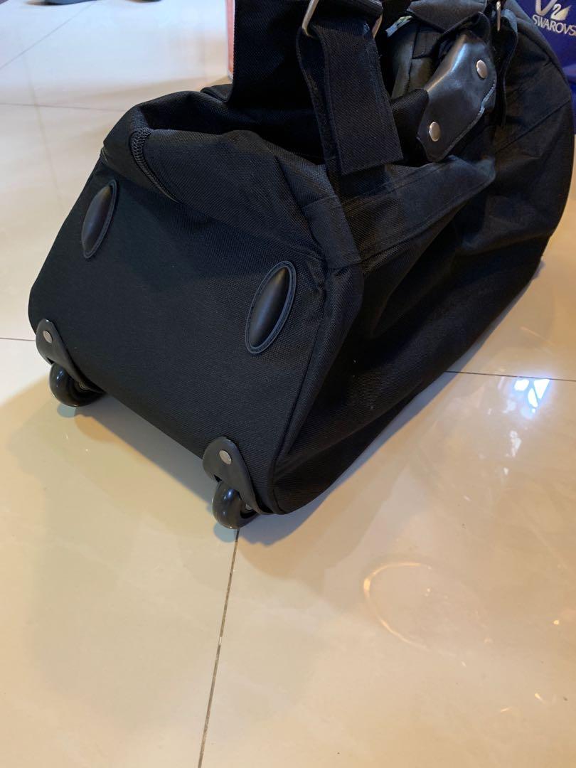 Giordano 2 wheel travel bag, Men's Fashion, Bags, Belt bags, Clutches