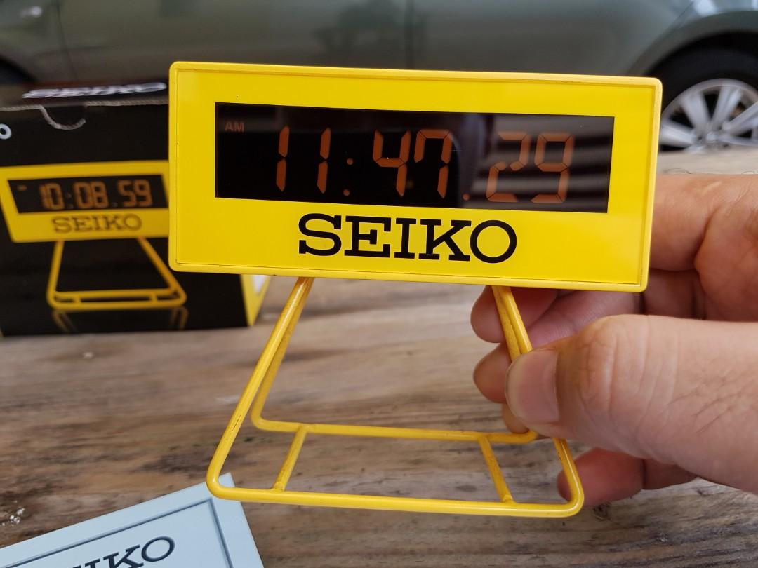 Seiko QHL062Y yellow digital desk clock, Sports Equipment, Other Sports  Equipment and Supplies on Carousell