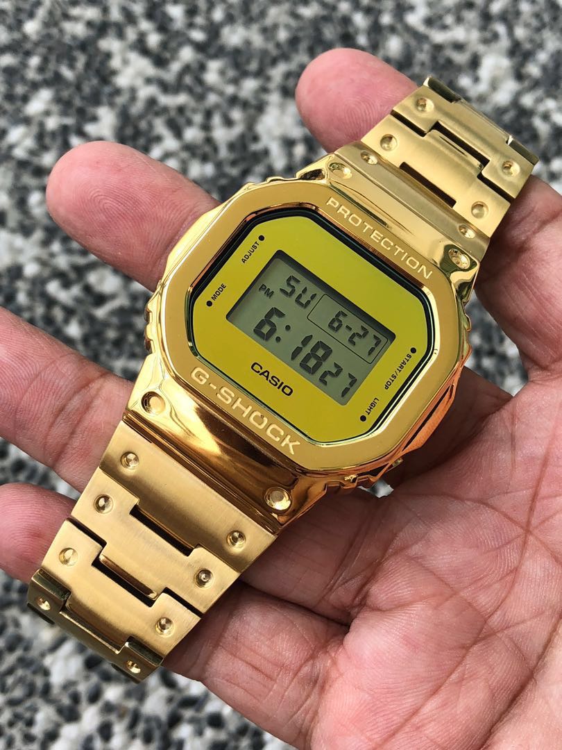 Casio dw 5600 deals gold