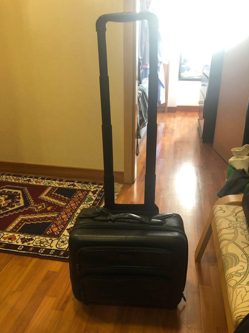 tumi leather carry on