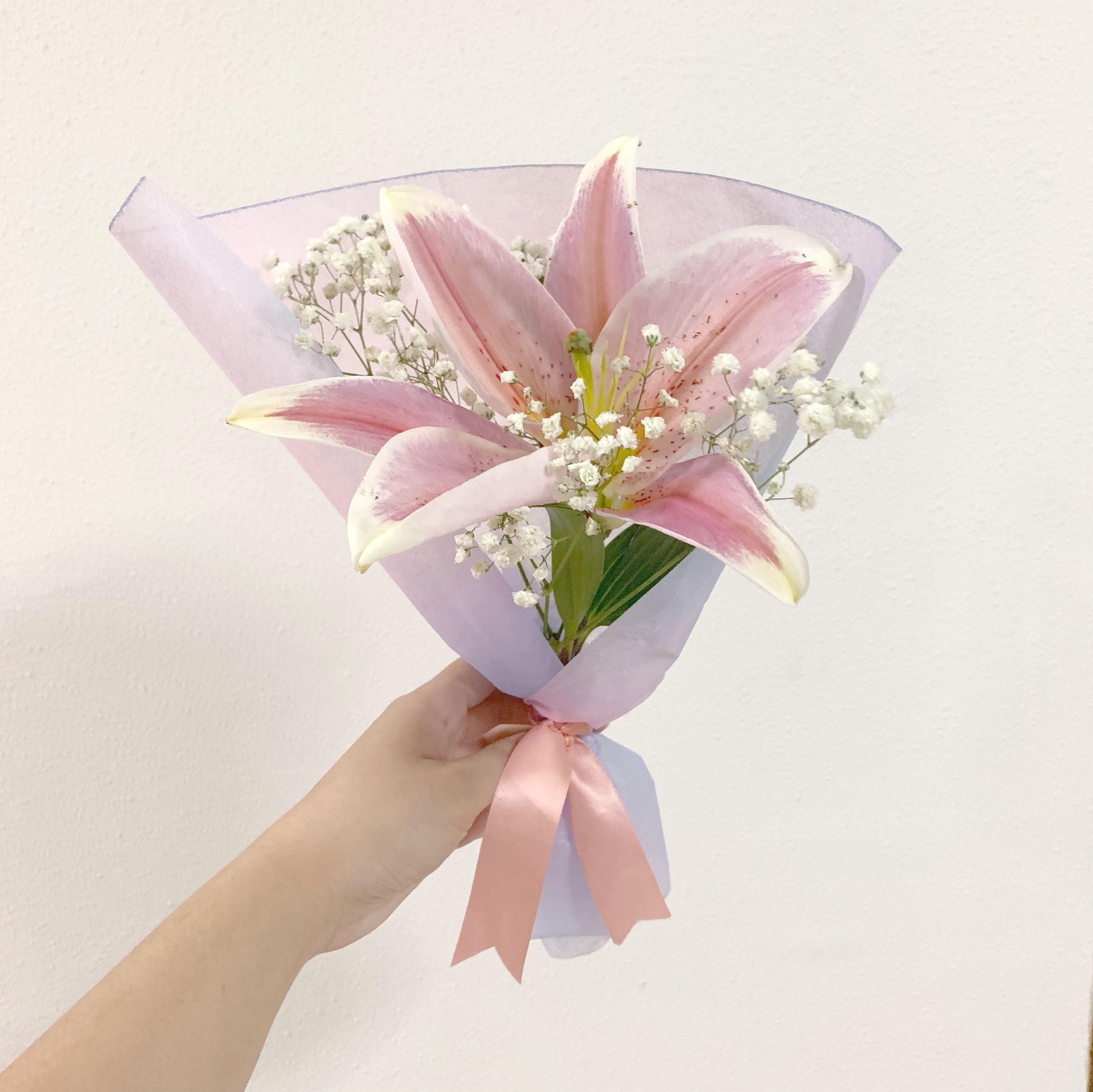 baby's breath and lily bouquet