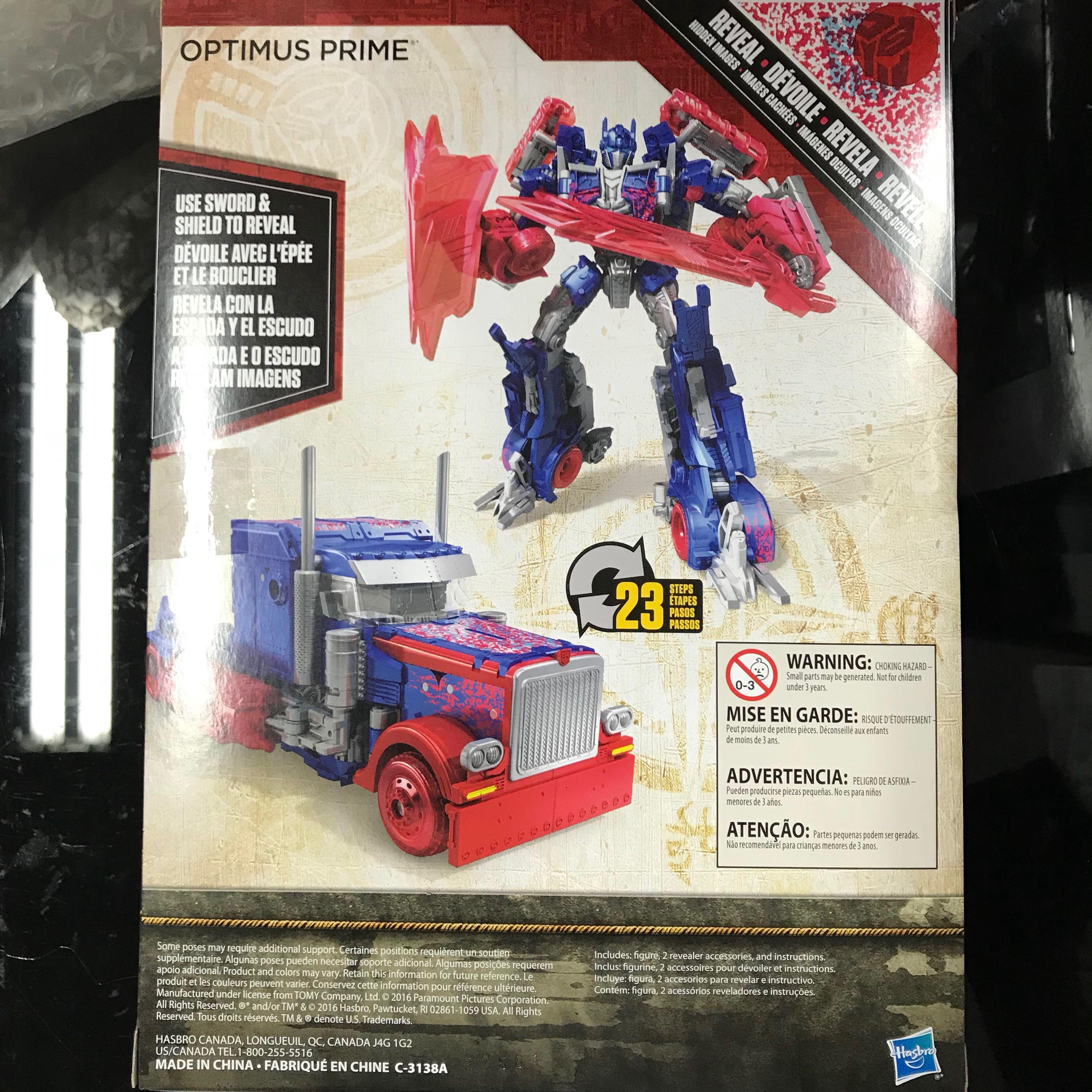Transformers reveal the shield top premier voyager optimus prime
