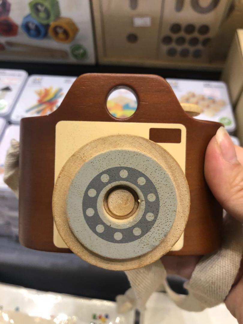 Wooden camera (Category: Educational & Learning Toys) located in Singapore. Submitted by jkxh_bits (Listing ID 191753671, Image 1). Description: Play pretend / mini me with baby! Wooden toy camera with string and adjustable zoom ring. .