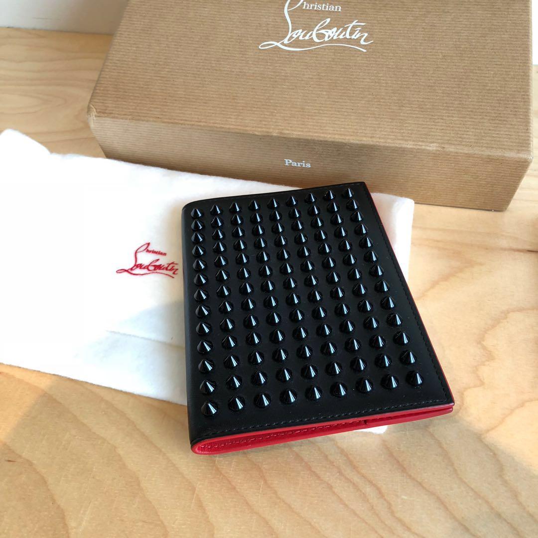 Louboutin online passport holder