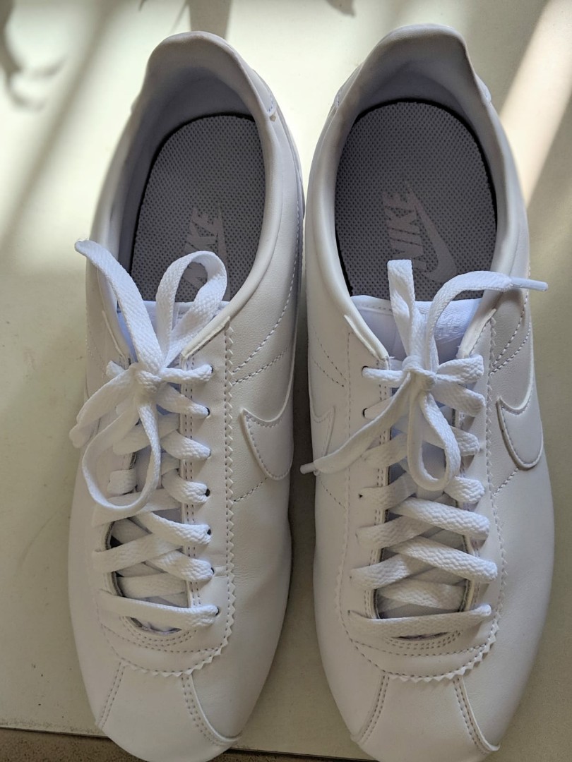 nike triple white leather cortez trainers