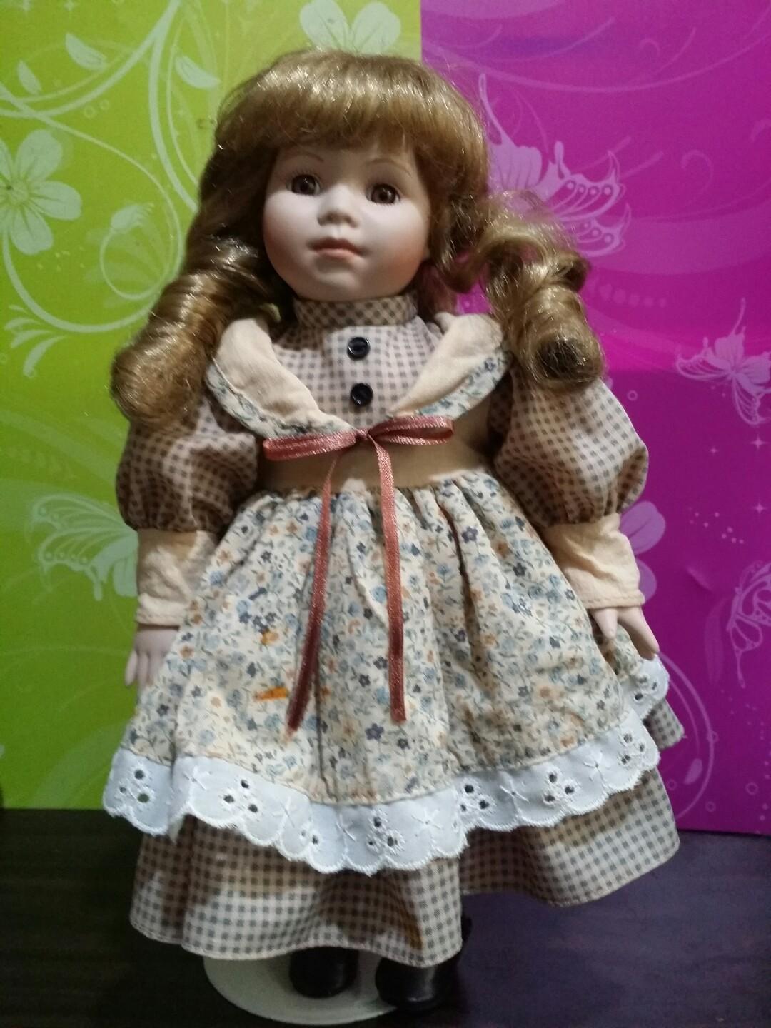 wind up porcelain doll
