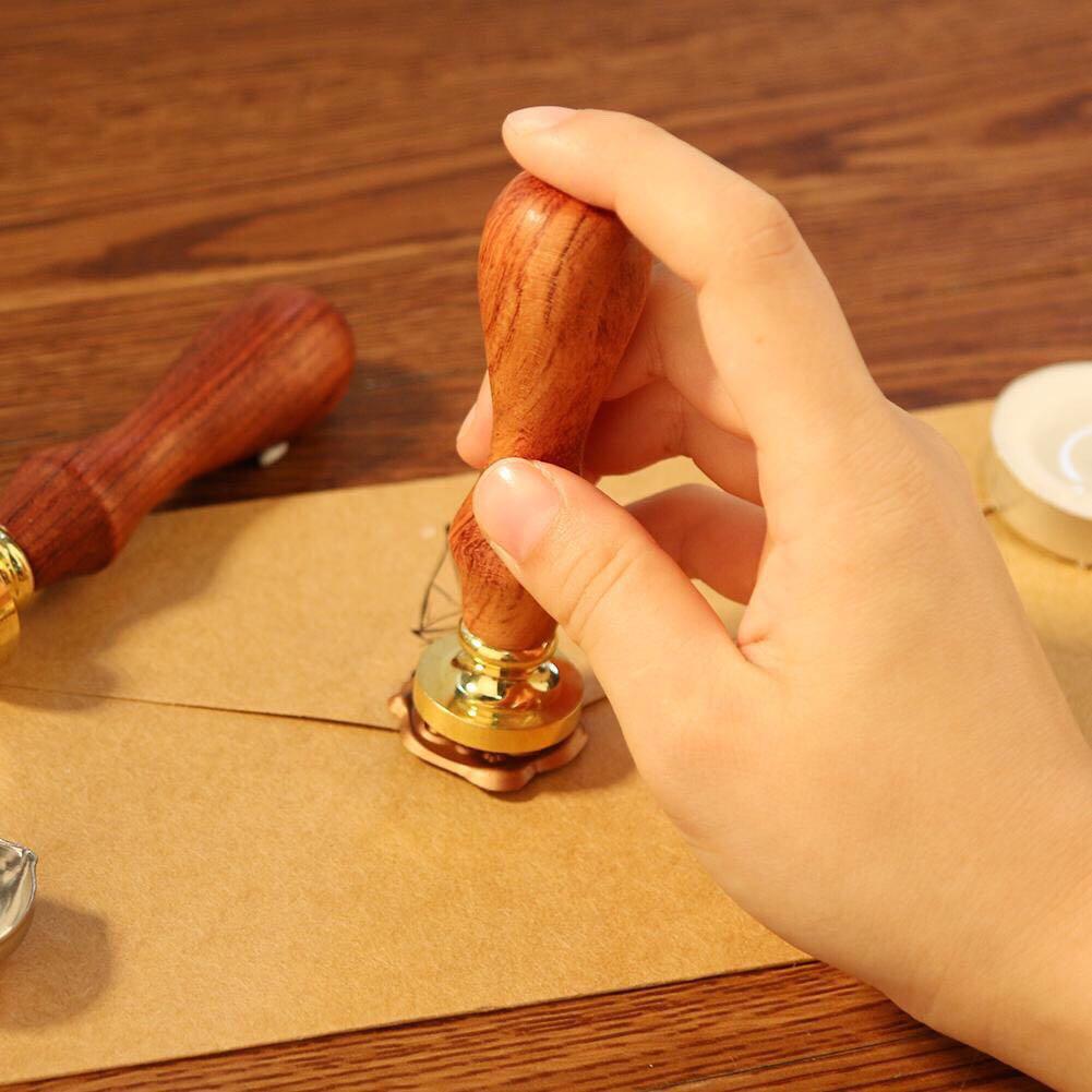 SET B stamp head (Category: Craft Supplies & Tools) located in Manila. Submitted by scratch_ph (Listing ID 209222663, Image 3). Description: WITHOUT BOX but placed inside a small drawstring bag What’s inside? •Stamp head with wood handle (choose letter) • 3 wax seal • vintage spoon • 2 small candle.