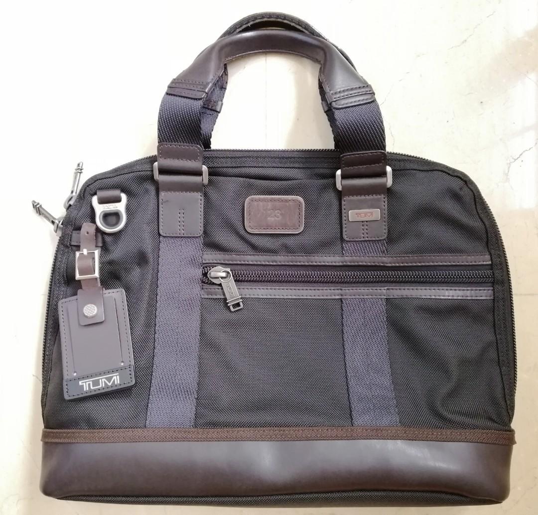 Tumi earle compact sales brief
