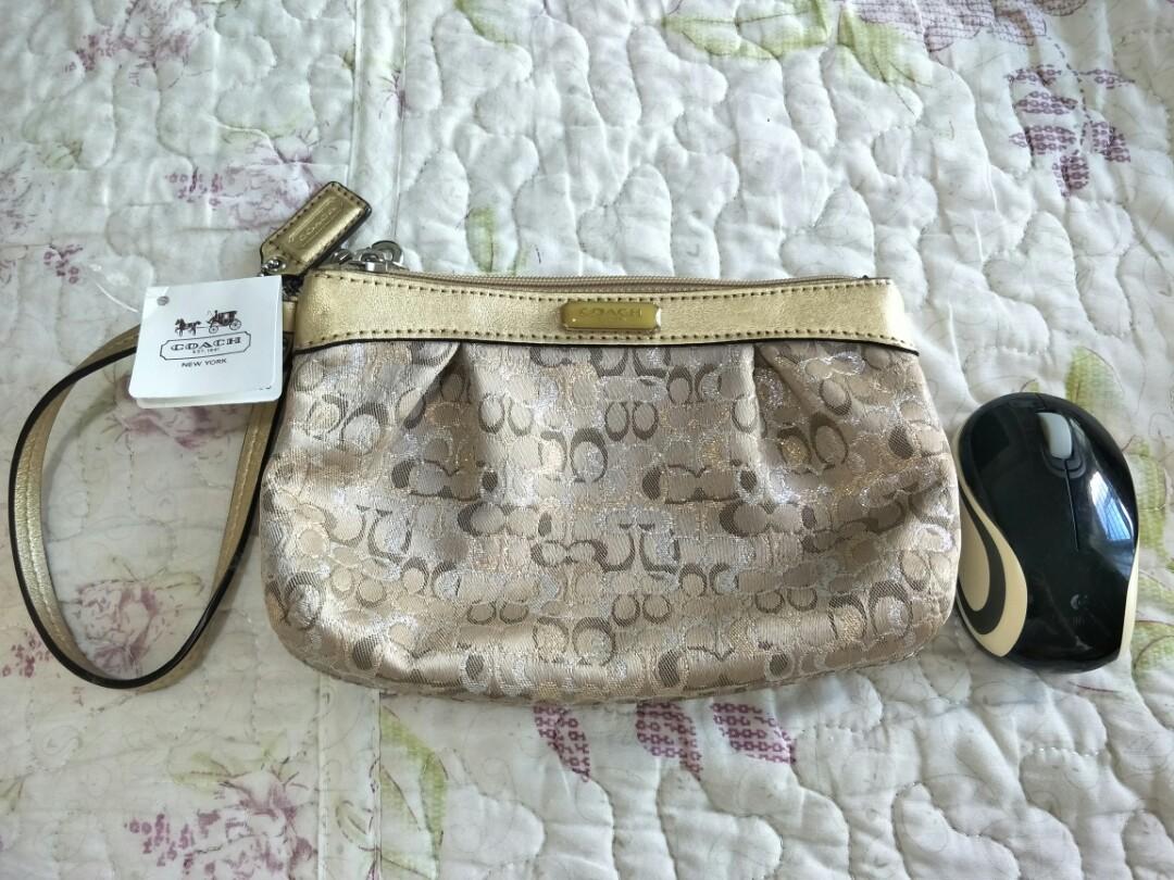 Gold coach hot sale wristlet
