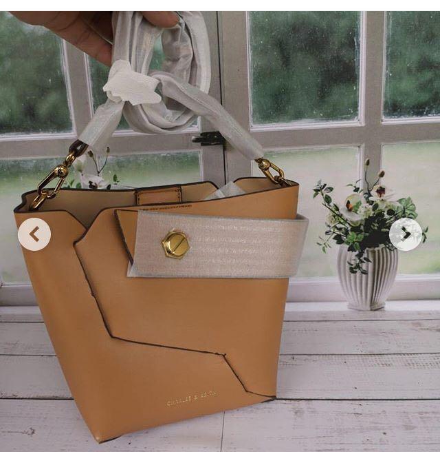 charles and keith wristlet bucket bag