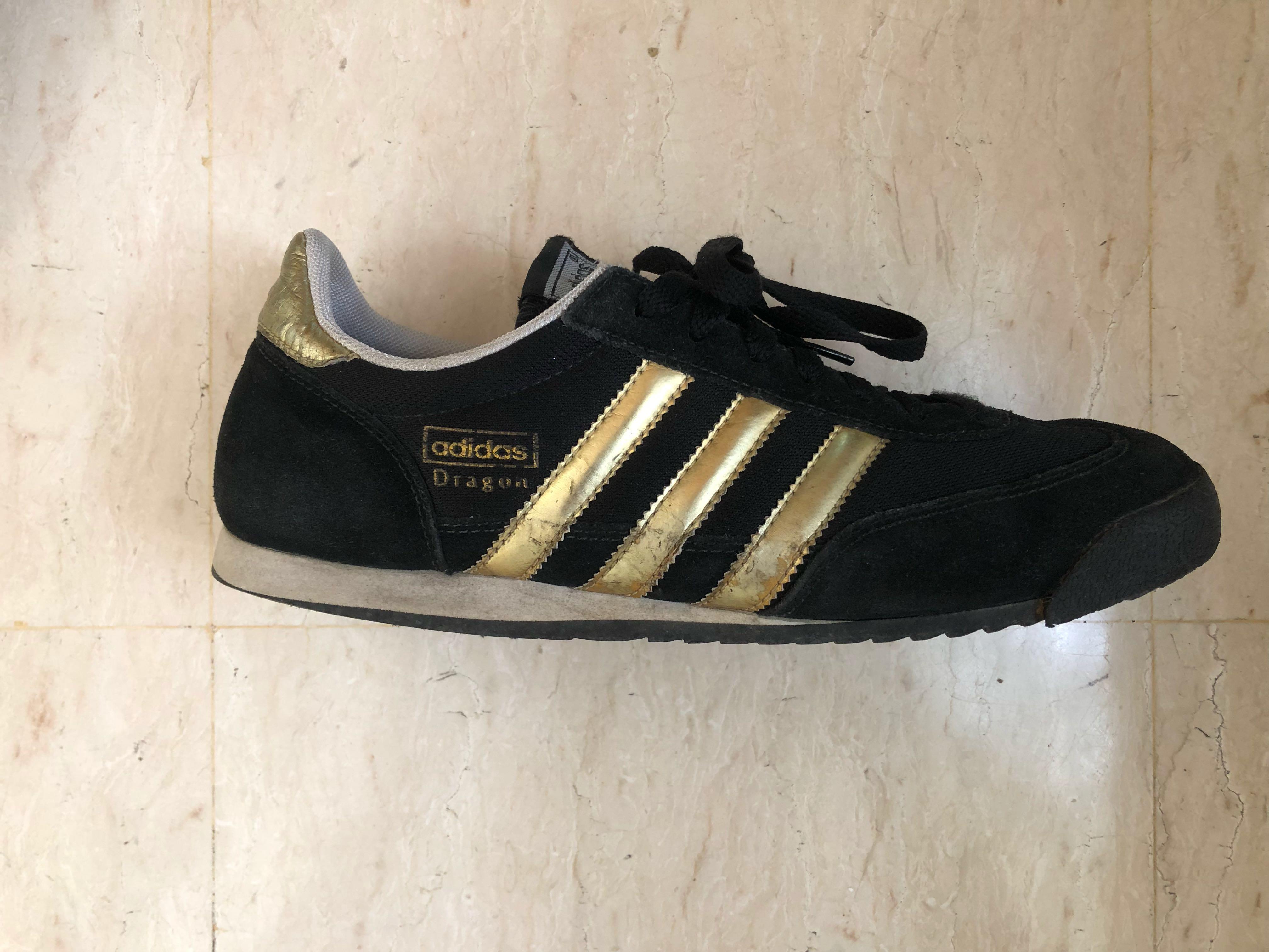 adidas dragon black and gold