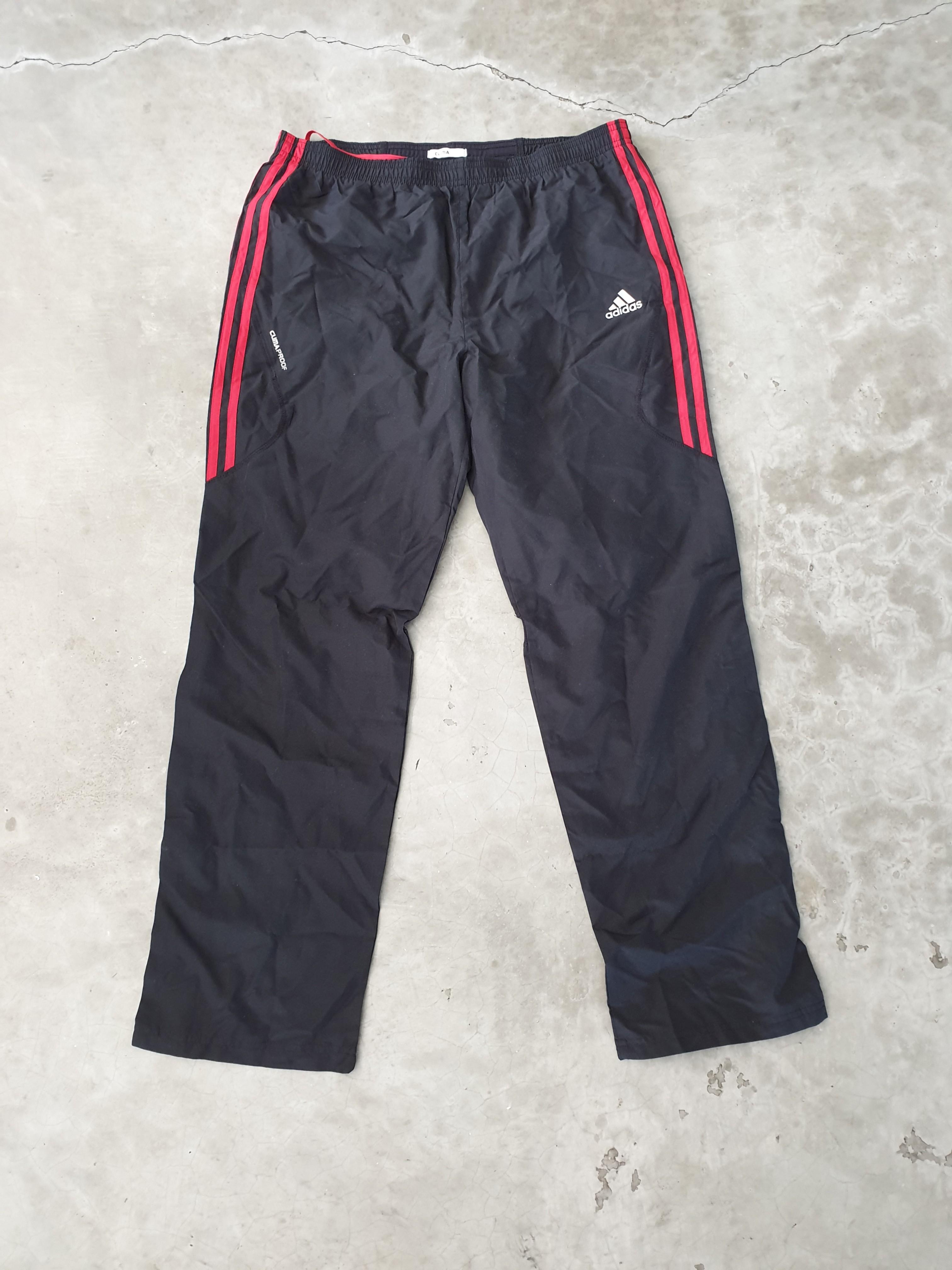 adidas track pants red stripes