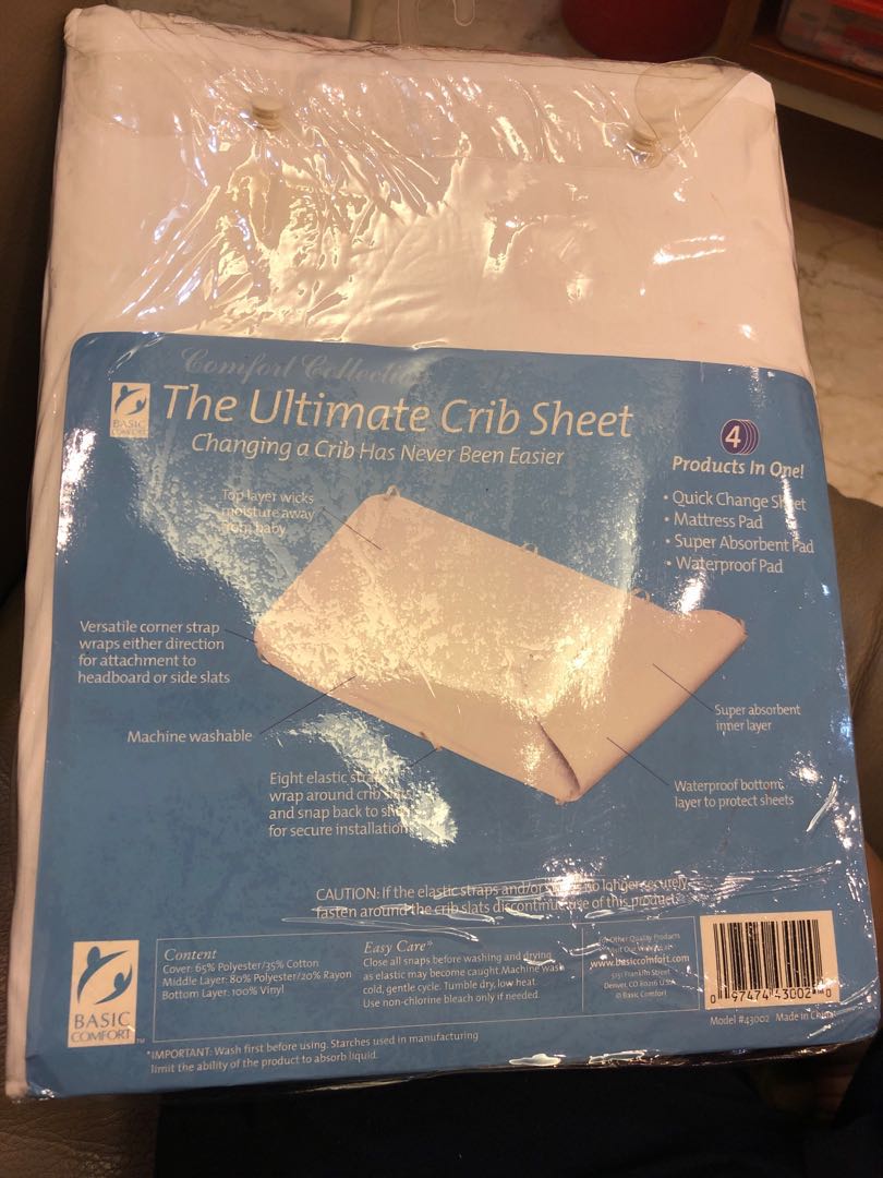 crib sheet protector with snaps