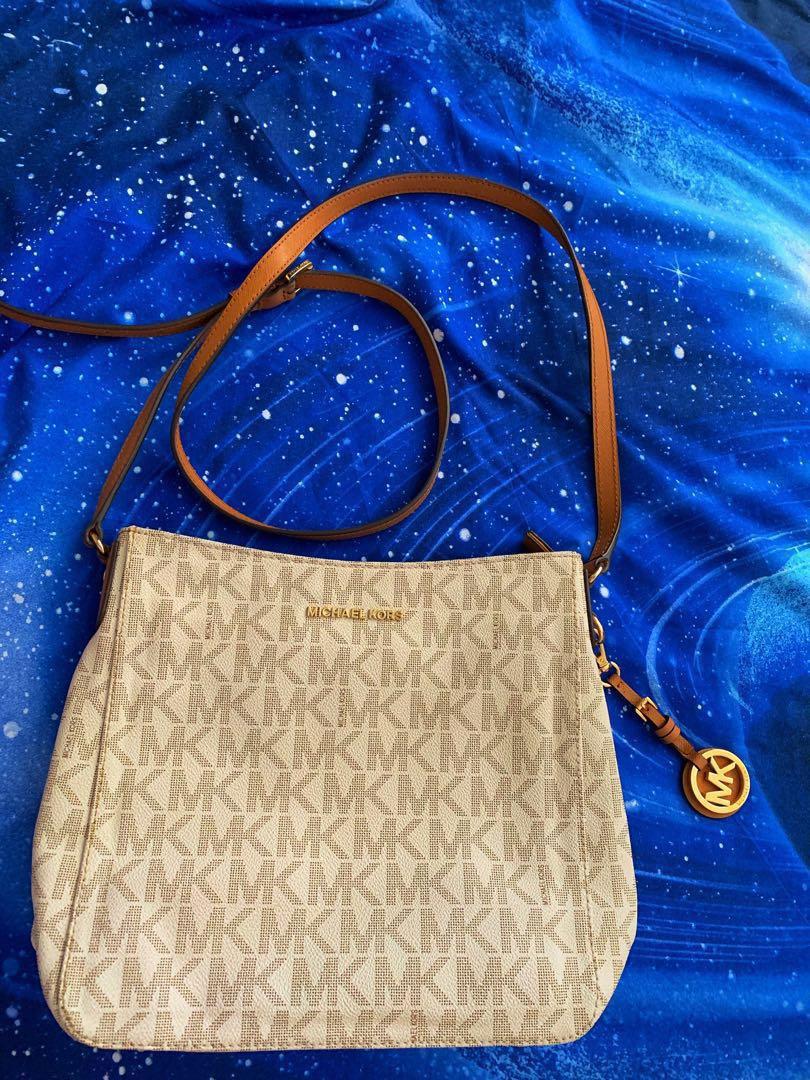 mk sling bag canada