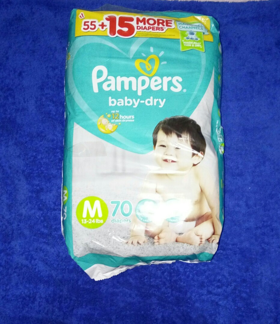 Pampers medium taped diapers 70s, Babies & Kids, Bathing & Changing