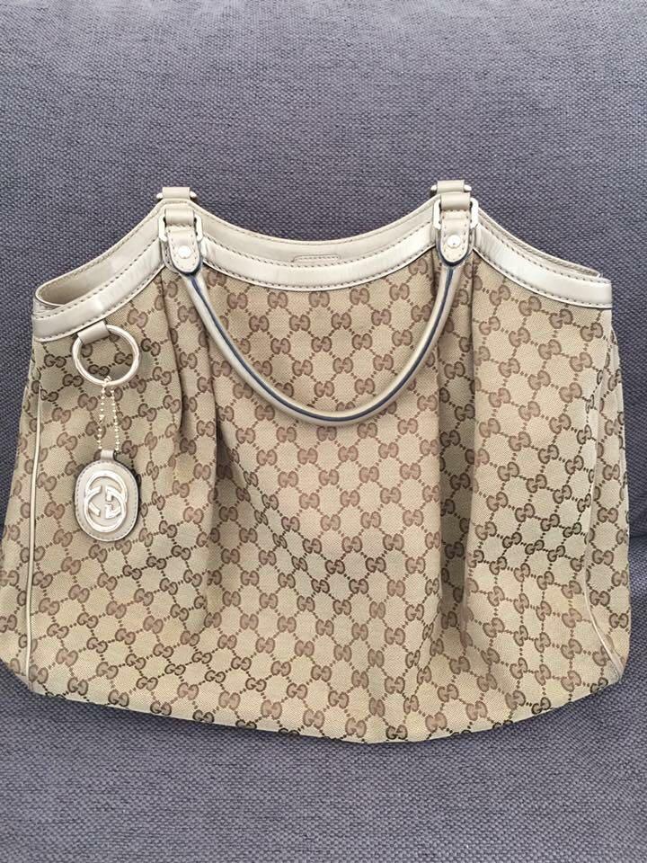 GUCCI Monogram Large Sukey Tote Champagne (Category: Luxury Bags & Wallets) located in Paranaque City. Submitted by marshy (Listing ID 200551565, Image 1). Description: • Preloved Gucci Sukey Large Tote, in very good condition overall. Slight signs of wear but not obvious. Please refer to photos for specifics - 1 minor popped stitch on the back part, surface wear on handles and marks on interior. • Inclusions: Cards, swatch, dust bag • Purchased: