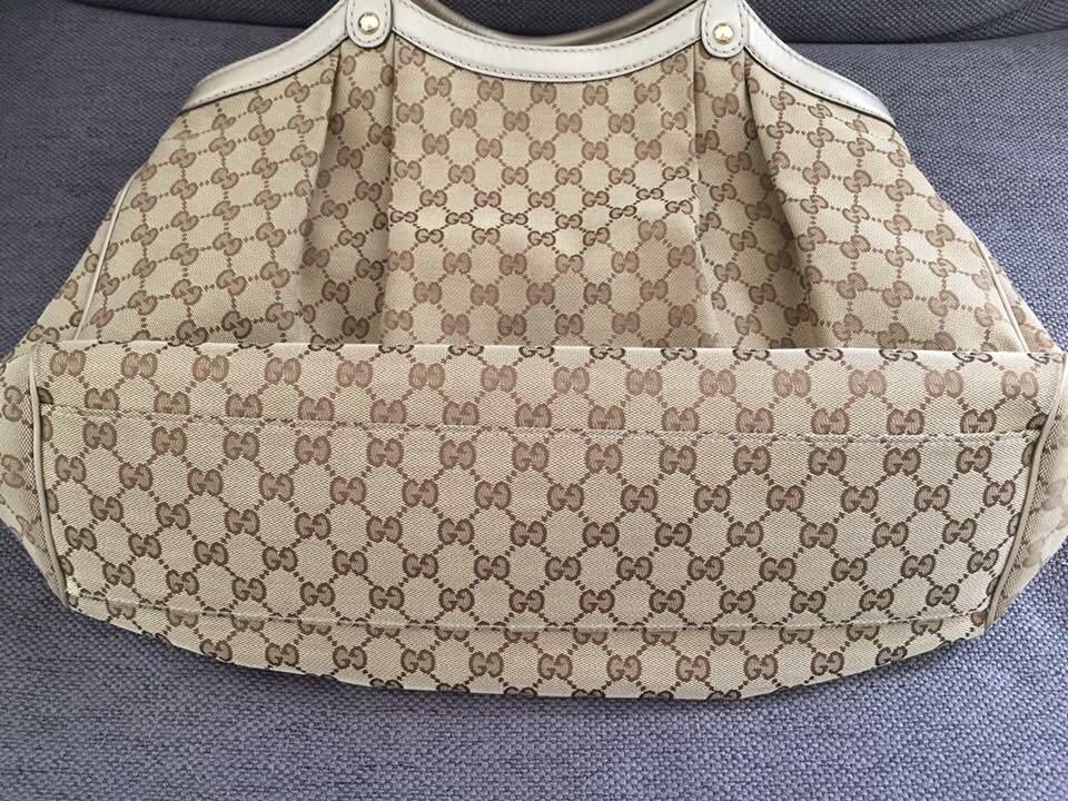 GUCCI Monogram Large Sukey Tote Champagne (Category: Luxury Bags & Wallets) located in Paranaque City. Submitted by marshy (Listing ID 200551565, Image 2). Description: • Preloved Gucci Sukey Large Tote, in very good condition overall. Slight signs of wear but not obvious. Please refer to photos for specifics - 1 minor popped stitch on the back part, surface wear on handles and marks on interior. • Inclusions: Cards, swatch, dust bag • Purchased: