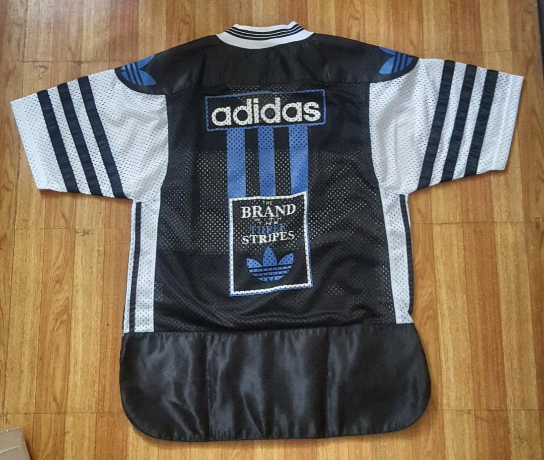 adidas brand with the 3 stripes shirt