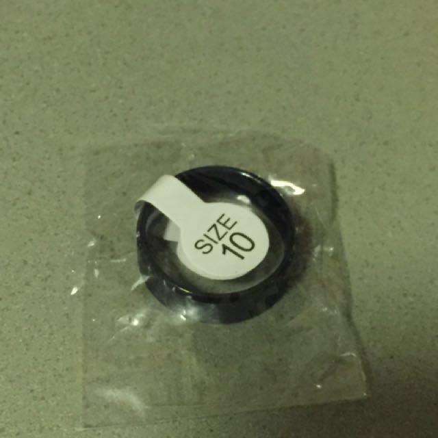 Titanium black ring (Category: Body Jewelry) located in Singapore. Submitted by fairymonster (Listing ID 148909112, Image 2). Description: Ottega titanium ring, black. Size 10. Brand new!! Price negotiable.