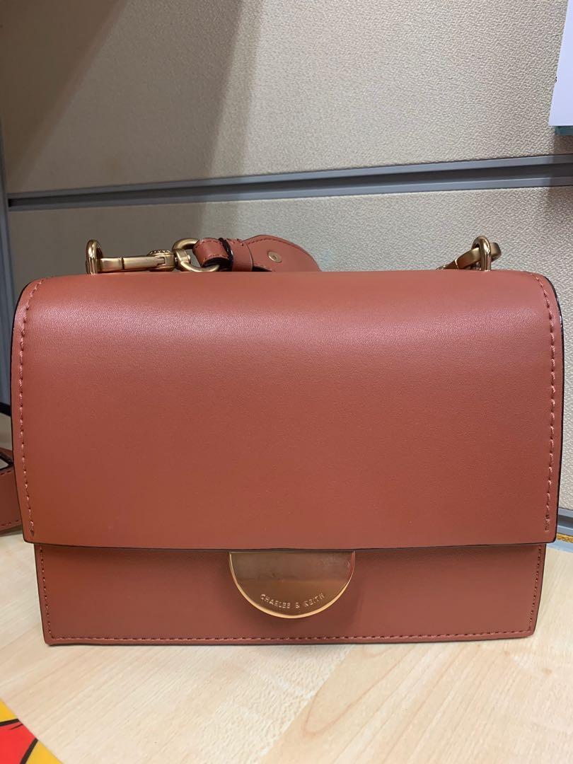 charles and keith metallic accent push lock bag