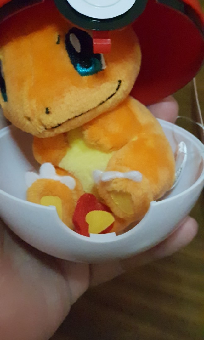 pokeball with plush pokemon inside