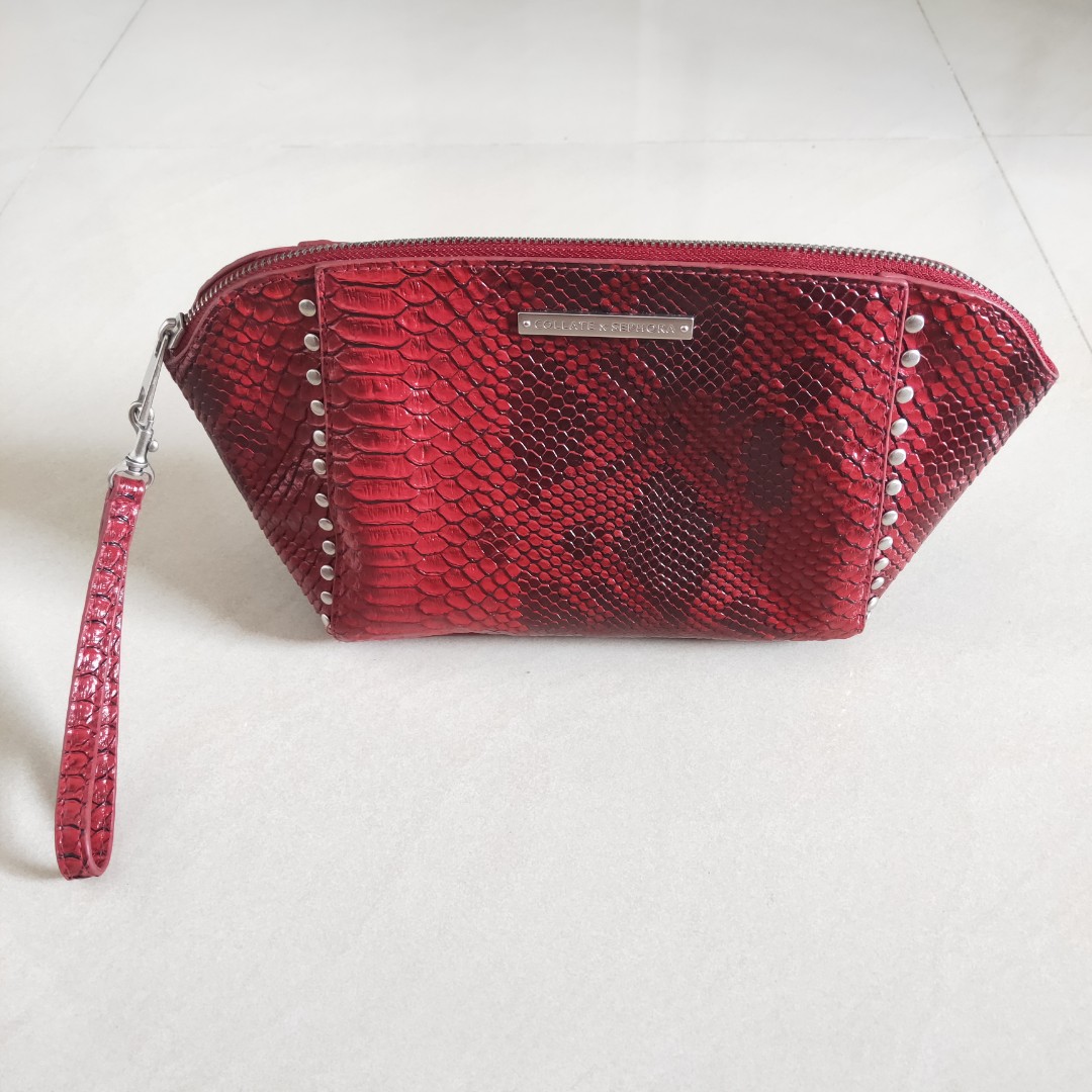 red and silver clutch bag