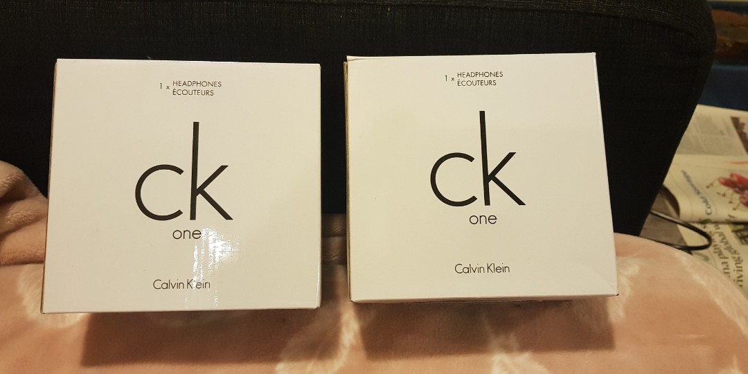 Calvin Klein headphone(white gold)x2pcs, Audio, Portable Audio Accessories  on Carousell
