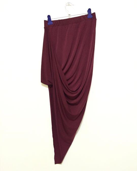 Charlotte Russe drape asymmetrical skirt (Category: Dresses) located in Tarlac. Submitted by mrsduque (Listing ID 210613314, Image 1). Description: Large on tag but would fit medium-large Worn once only Color: maroon.