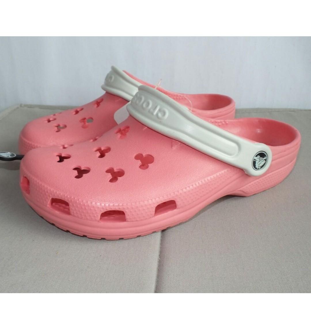 pink disney crocs