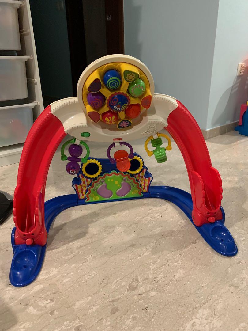 Fisher Price Baby Playzone Kick & Whirl Carnival with detachable spin ball & rattles!, Babies