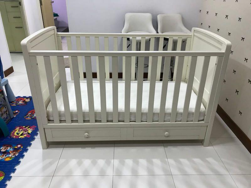 cot bed with changing unit