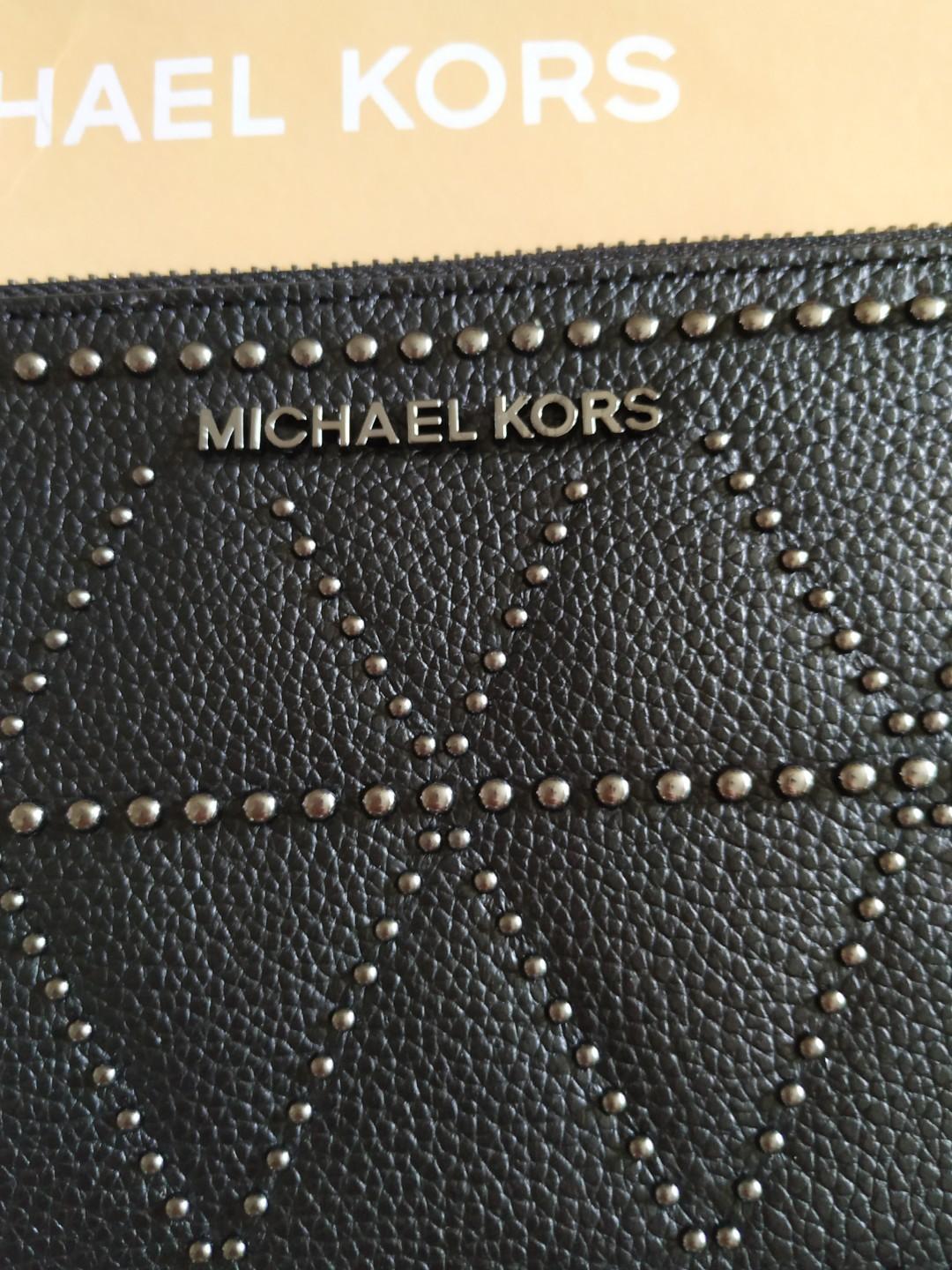 michael kors adele xl zip clutch