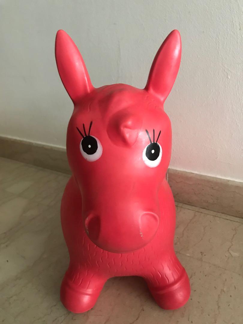 red bouncy horse