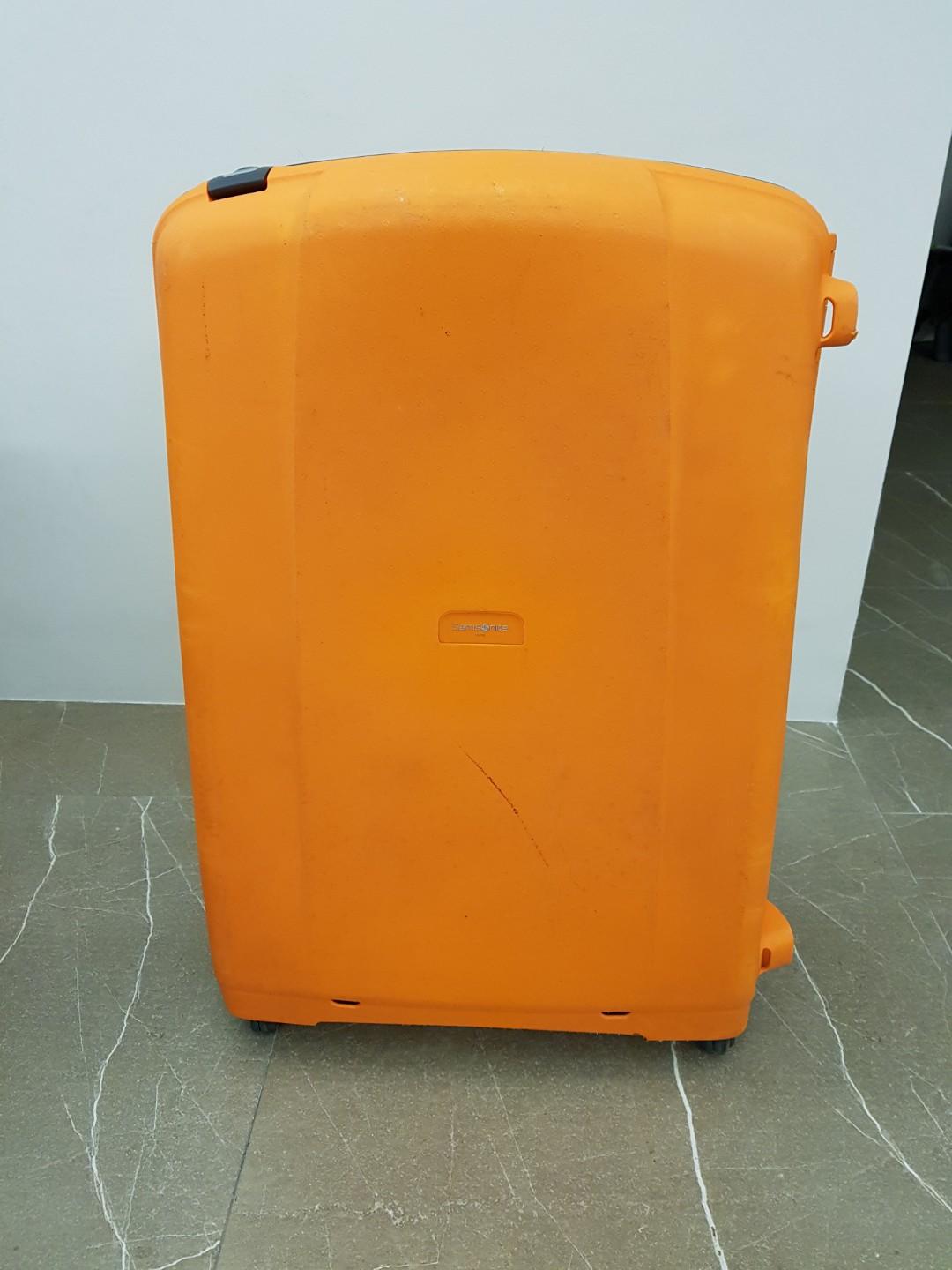 orange hard case luggage