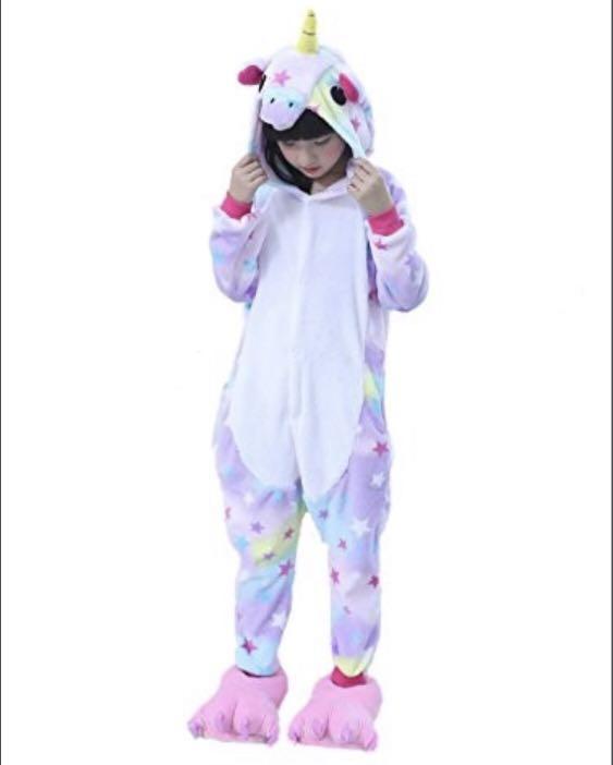 girl in unicorn onesie