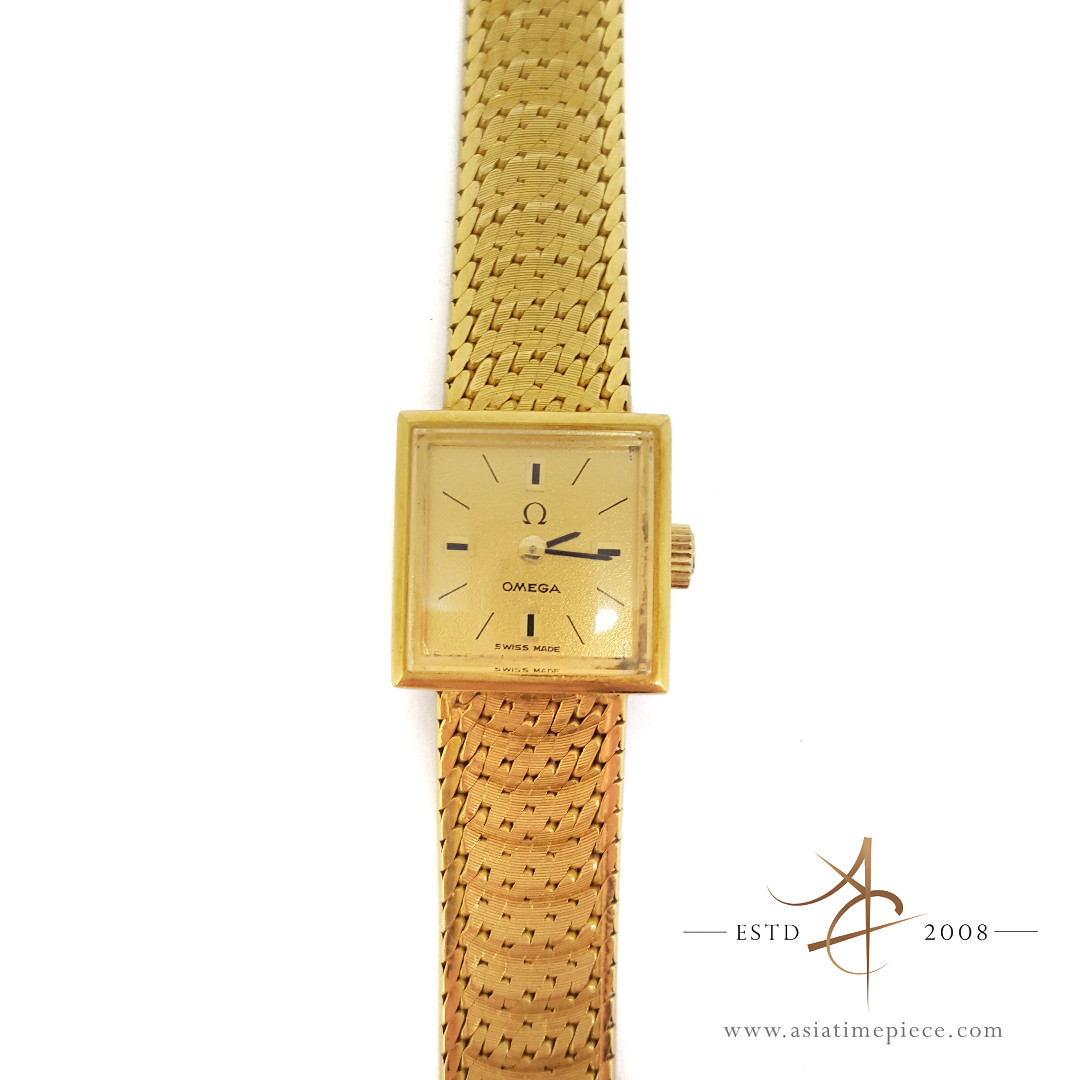 vintage omega solid gold watch