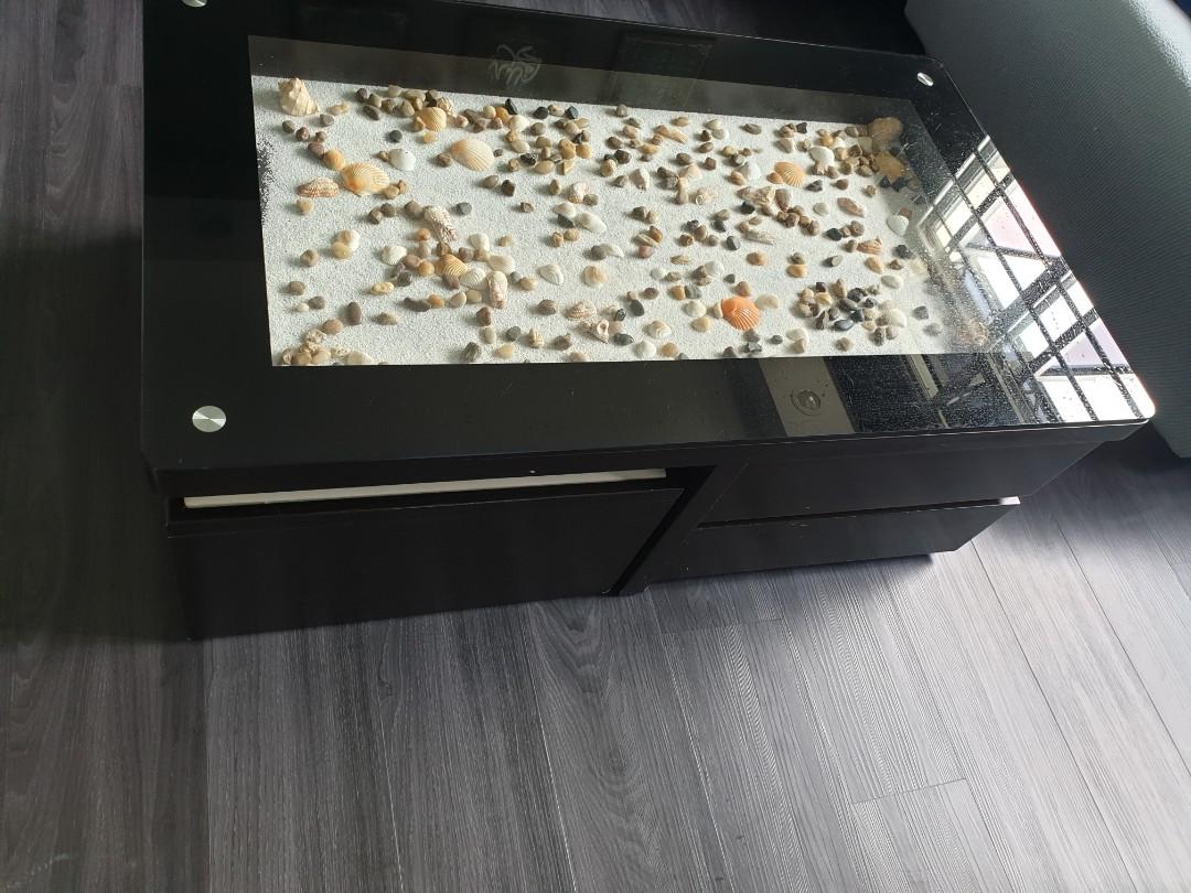 Coffee table (Category: Tables & Sets) located in Singapore. Submitted by damnzo13 (Listing ID 210997684, Image 2). Description: Price can be nego - Has 4 drawers - Top glass can be remove - Can decorate internal glass space - Has 2 chairs left and right corner Item self collect.