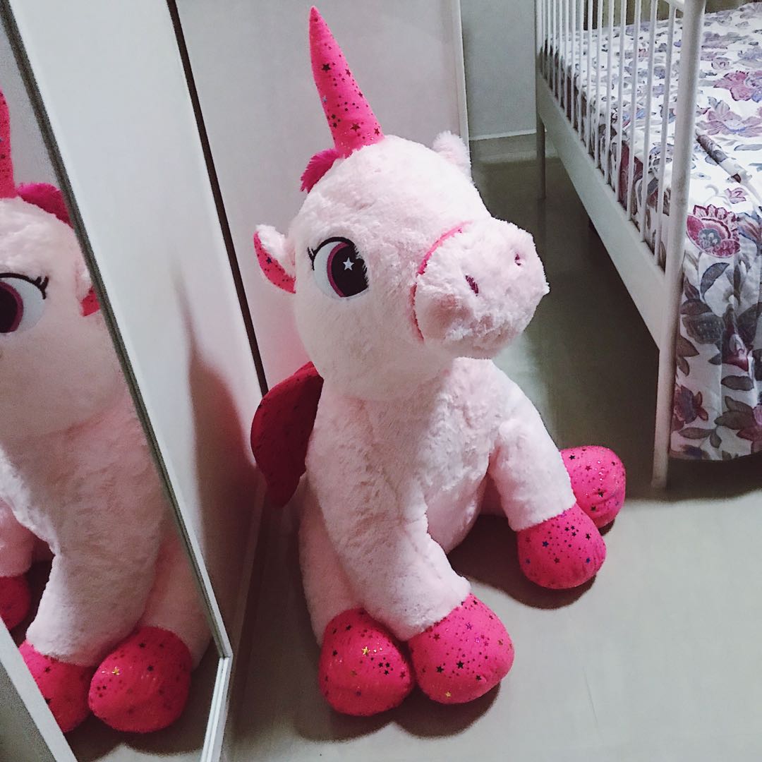 giant pink unicorn stuffed animal