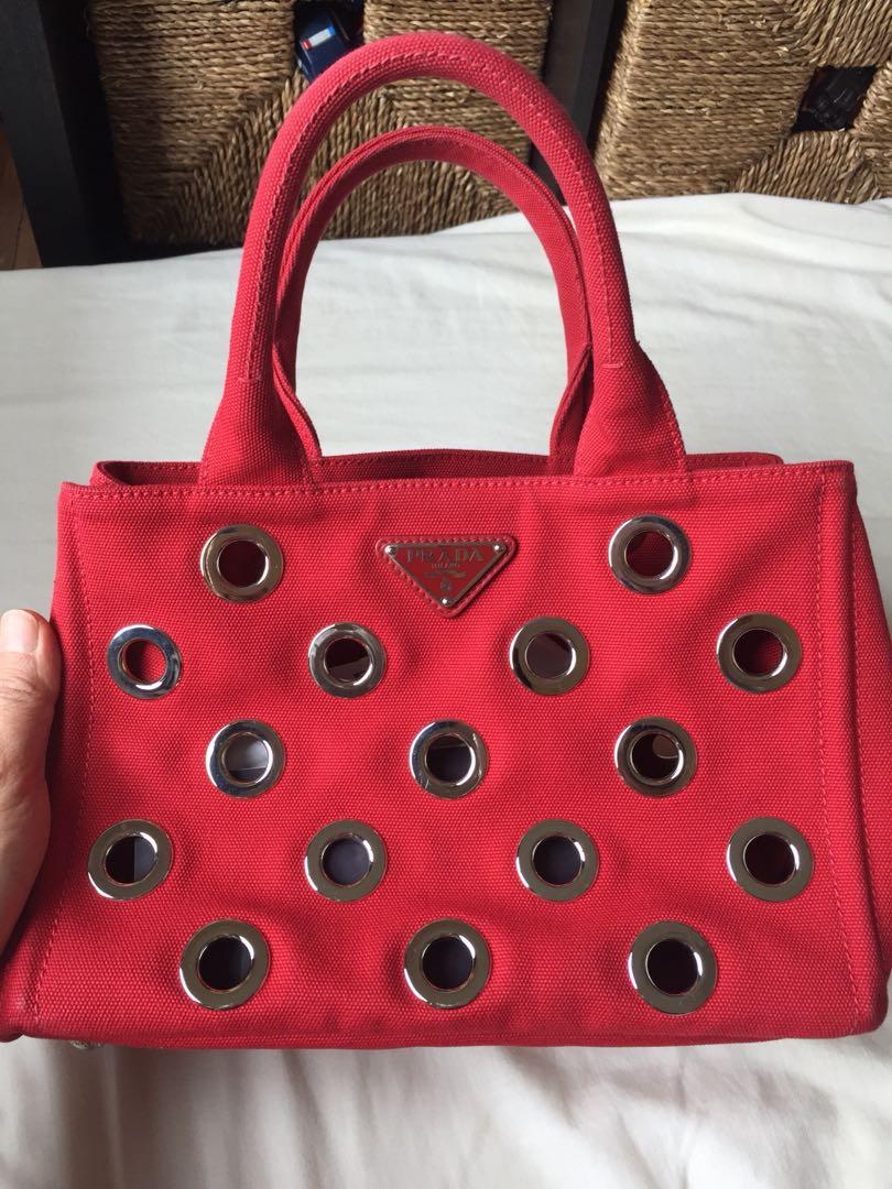 prada grommet bag