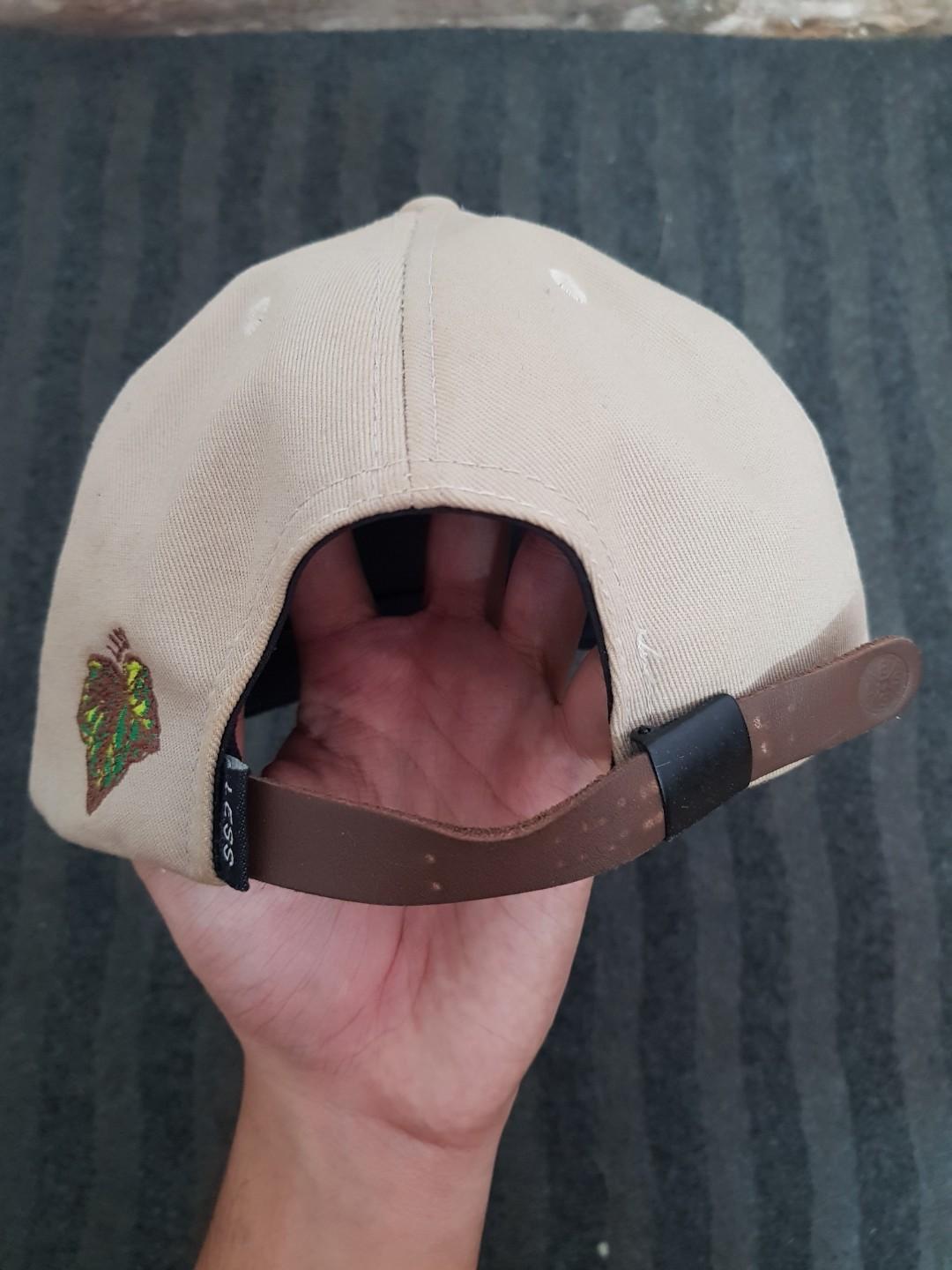 Less Snapback (Category: Cap & Hats) located in Johor Bahru. Submitted by iskandarshxh (Listing ID 211128898, Image 3). Description: Less Snapback Condition : 8 / 10 ( a bit dirty because been kept inside my wardrobe, but can be clean ) Size : - Color : Light Brown.