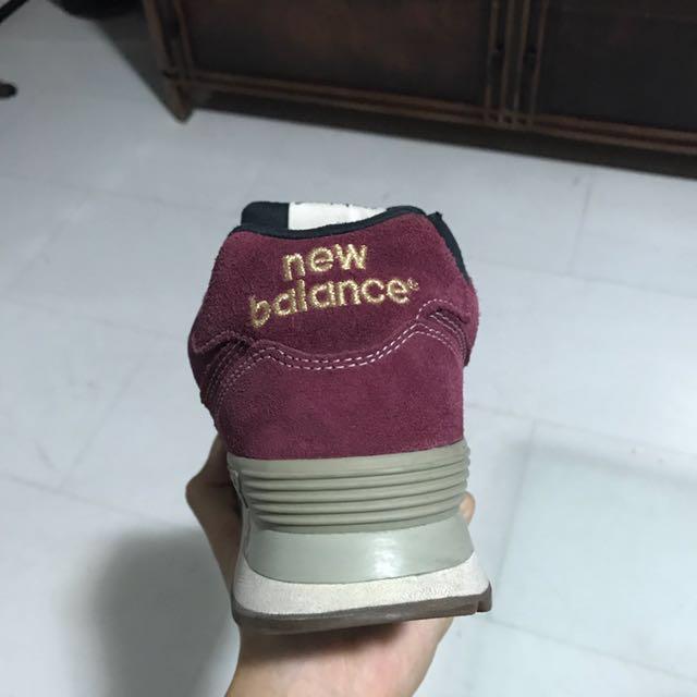 Maroon and gold new balance 574 2025