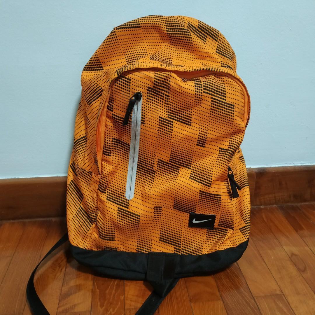 Nike backpacks orange clearance
