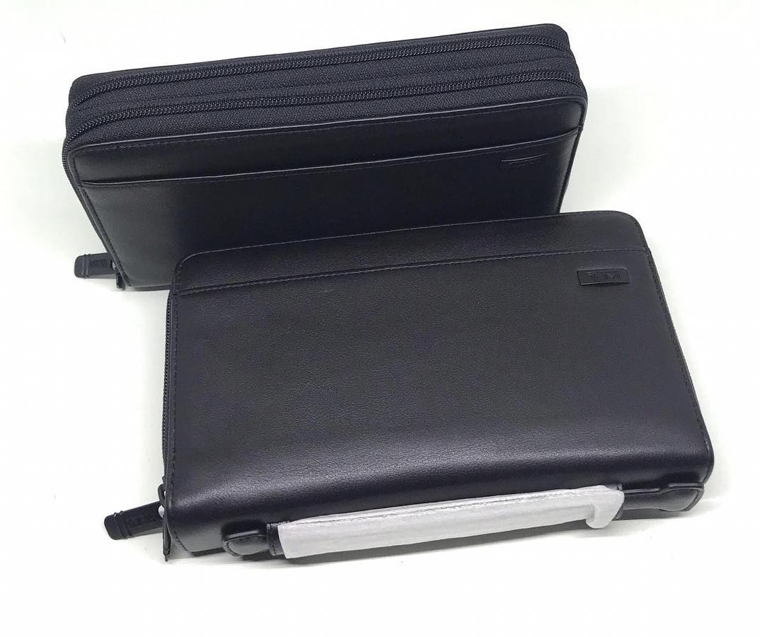 Tumi double zip around clutch hotsell