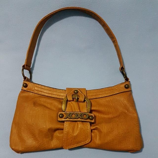XOXO Camel Bag (Category: Cross-body Bags) located in Paranaque City. Submitted by mamaalphaecho (Listing ID 211332551, Image 1). Description: FIXED PRICE = READ THE ENTIRE AD PRIOR TO INQUIRY. Click "READ MORE" = Used 3x max then stored. Faux leather with brass accents. Purchased in the US. This is a used item so please manage your expectations. Price is FIRM. Lowballers will not be entertained. Payment is thru bank deposit (BDO, Metrobank or BP